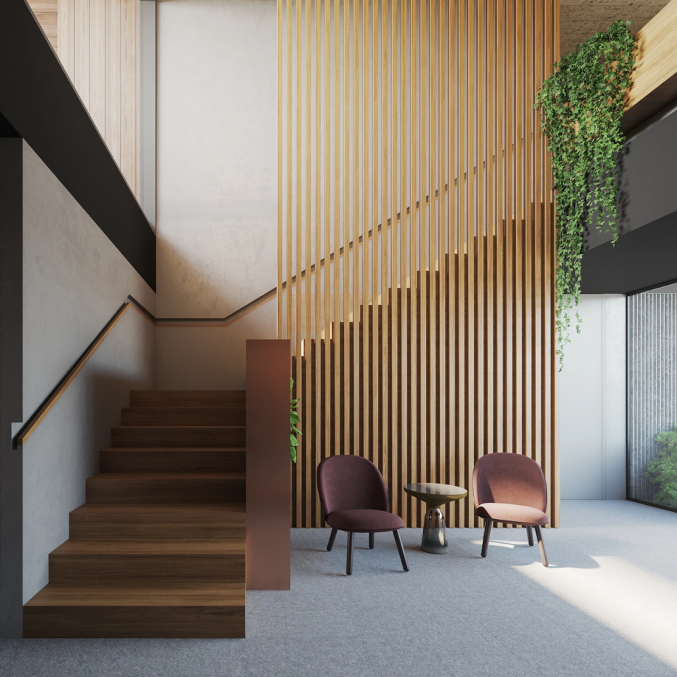 This detached single-family home features contemporary and sophisticated interiors, where natural wood, vertical textures, and zenithal light create warm spaces with strong architectural character. The staircase, integrated into a minimalist and elegant composition, reinforces the sense of spaciousness and visual continuity, achieving a balance between functionality, design, and comfort.