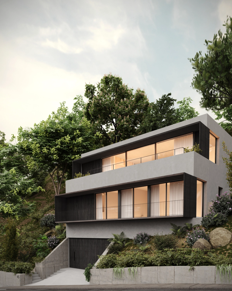  The main façade of a contemporary single-family house integrated into the Mediterranean landscape. Dissenay project for architects on the Costa Brava. Three-storey house with large windows. House in Begur