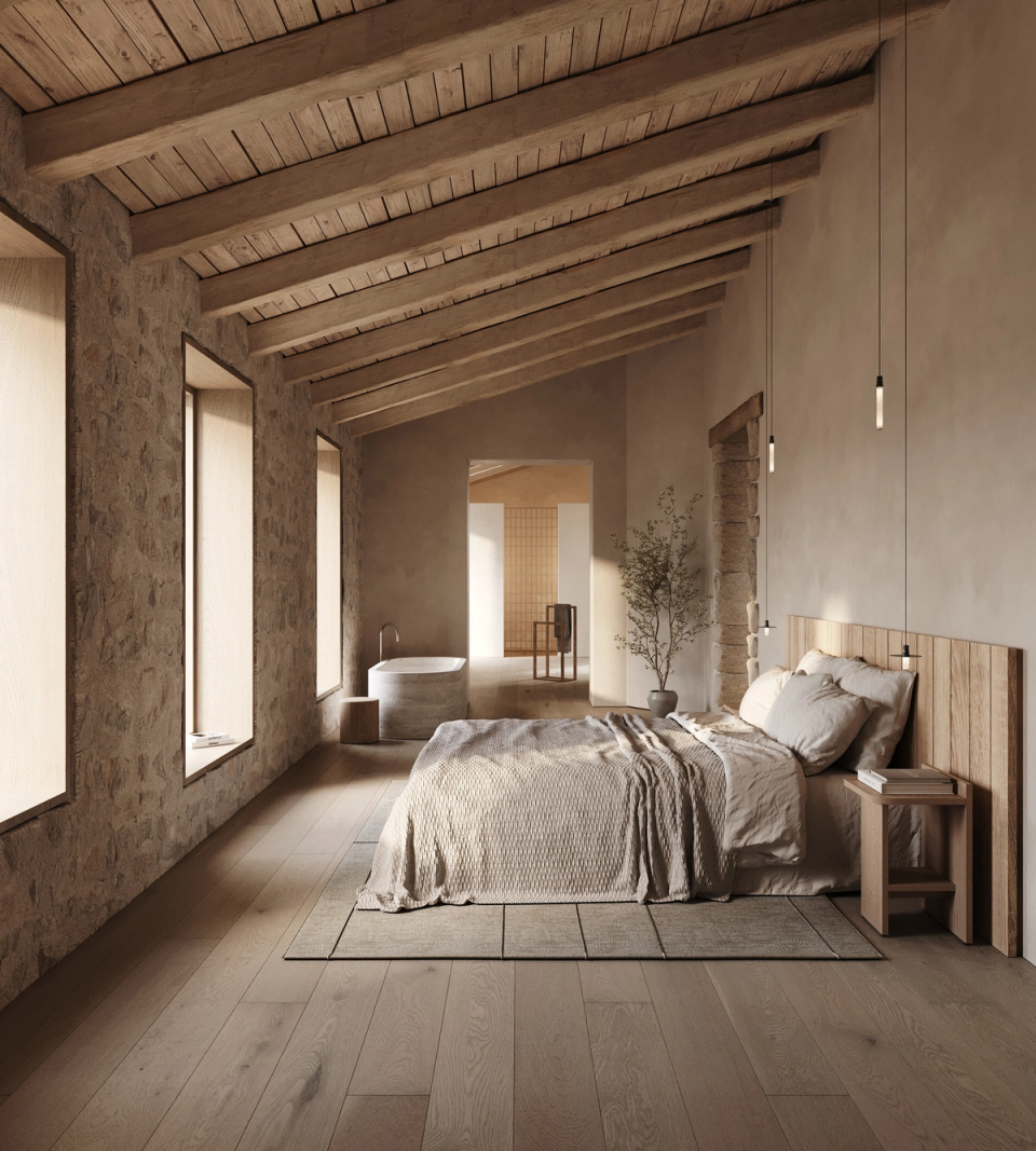 The renovation of this farmhouse creates warm and bright interior spaces where natural stone and wood recover the original essence of the masia. Light, materials, and textures generate a serene and welcoming atmosphere. Every detail of the project seeks to connect architecture, comfort, and landscape. This home renovation adapts tradition to a contemporary way of living.
