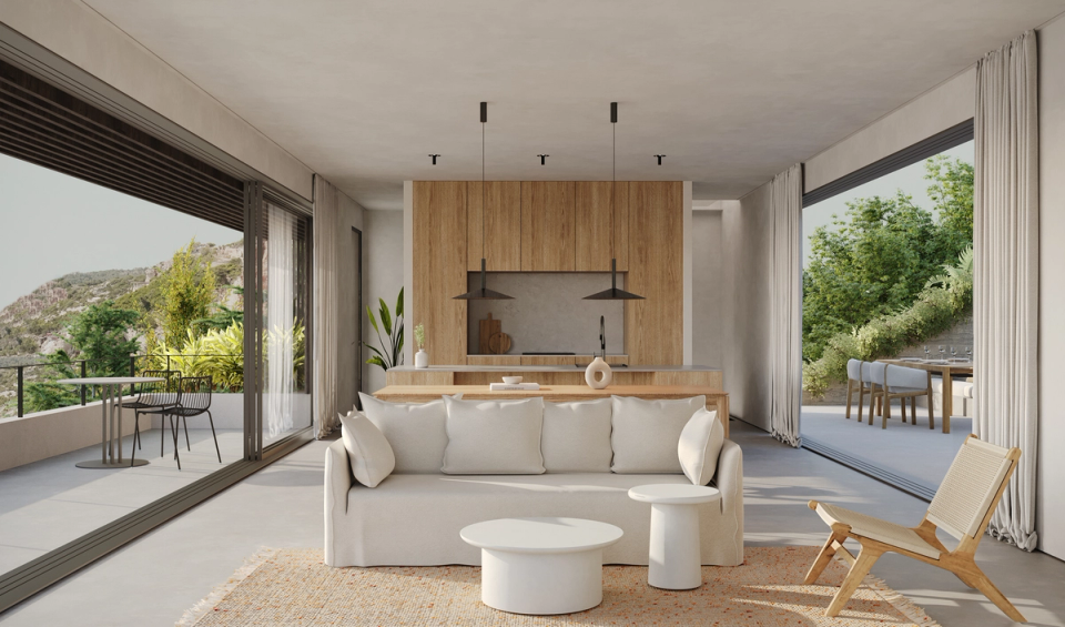 New construction house in Begur. Contemporary residential architecture with interior-exterior connection. The living room is functional and with open spaces with panoramic views of the coast. Wood, whites and soft tones provide balance and calm.