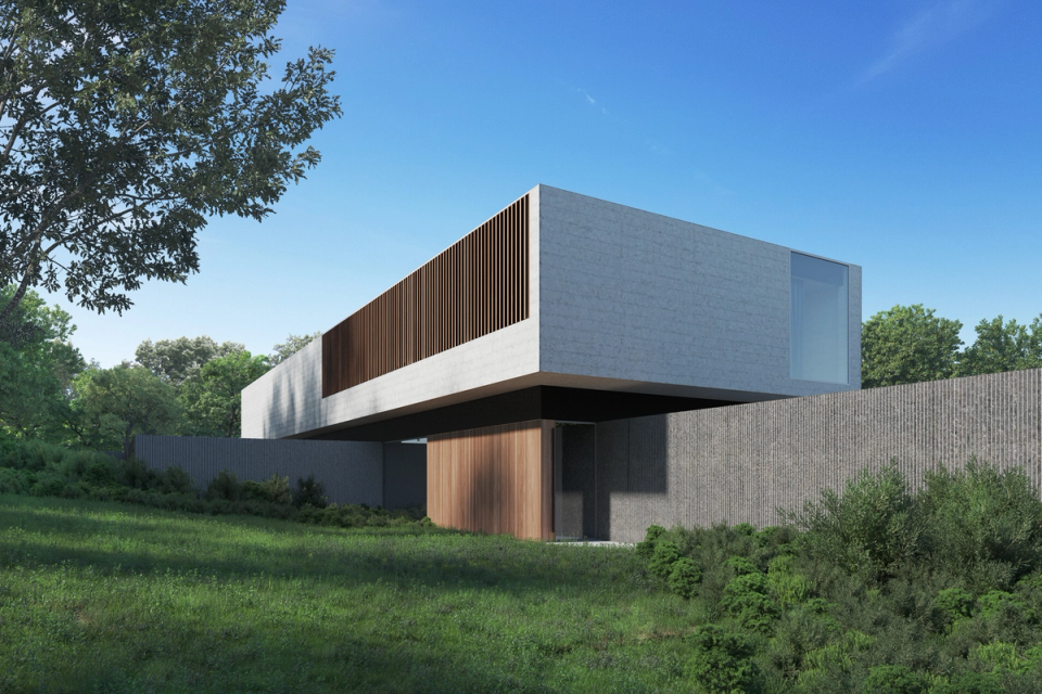 This detached single-family home stands out for its minimalist and sculptural architecture, defined by a large cantilevered volume that creates a contemporary, elegant, and bold image. The combination of concrete, wood, and large opaque surfaces creates an intimate and protected home, perfectly integrated into the natural surroundings and designed to enhance privacy, light, and spatial quality.