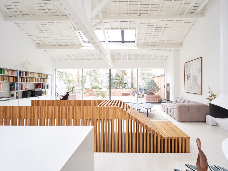 This full renovation embraces an open, bright and minimalist design, enhancing the connection between the kitchen, living room and common areas. The restoration of the original wooden structure and the use of neutral tones create a serene and elegant atmosphere, while natural materials add warmth and balance throughout the home.