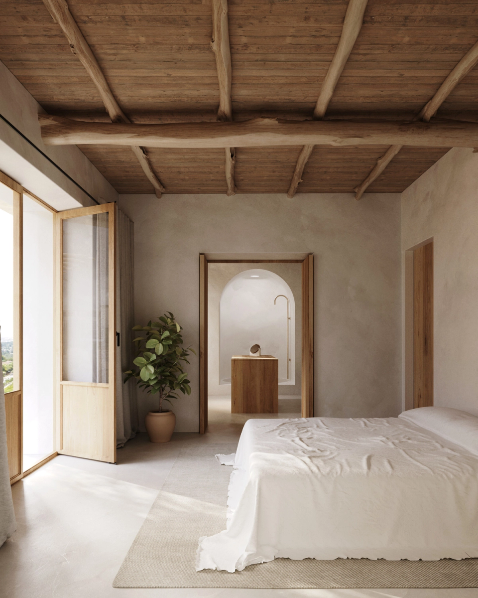 The renovation of this farmhouse in Ibiza restores the essence of traditional Mediterranean interiors through natural materials, soft light and serene spaces. Wooden beams, mineral finishes and openings to the outdoors create a warm and timeless atmosphere. The project combines authenticity, calm and contemporary comfort within an architecture integrated into the landscape.