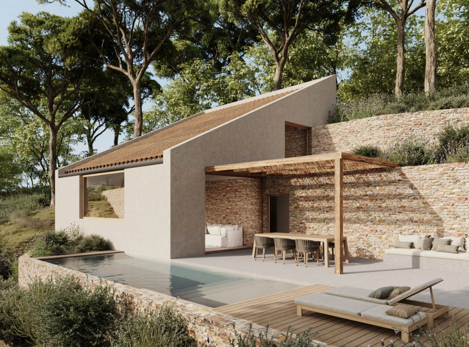 House in Tamariu opened to the Mediterranean landscape through serene architecture integrated into the site’s topography. Natural stone walls, mineral textures, and wooden structures create warm and luminous outdoor spaces, with a continuous relationship between the pool, terraces, and the natural surroundings.