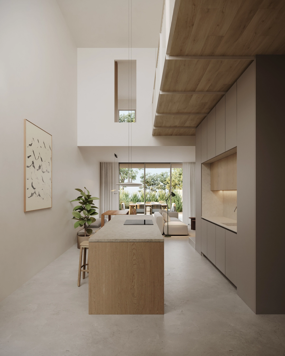 Houses in Bescanó with an open kitchen and high interior spaces that enhance natural light and the feeling of spaciousness. These houses in Bescanó combine natural wood, minimalist lines, and a fluid layout to create contemporary, elegant, and comfortable architecture.