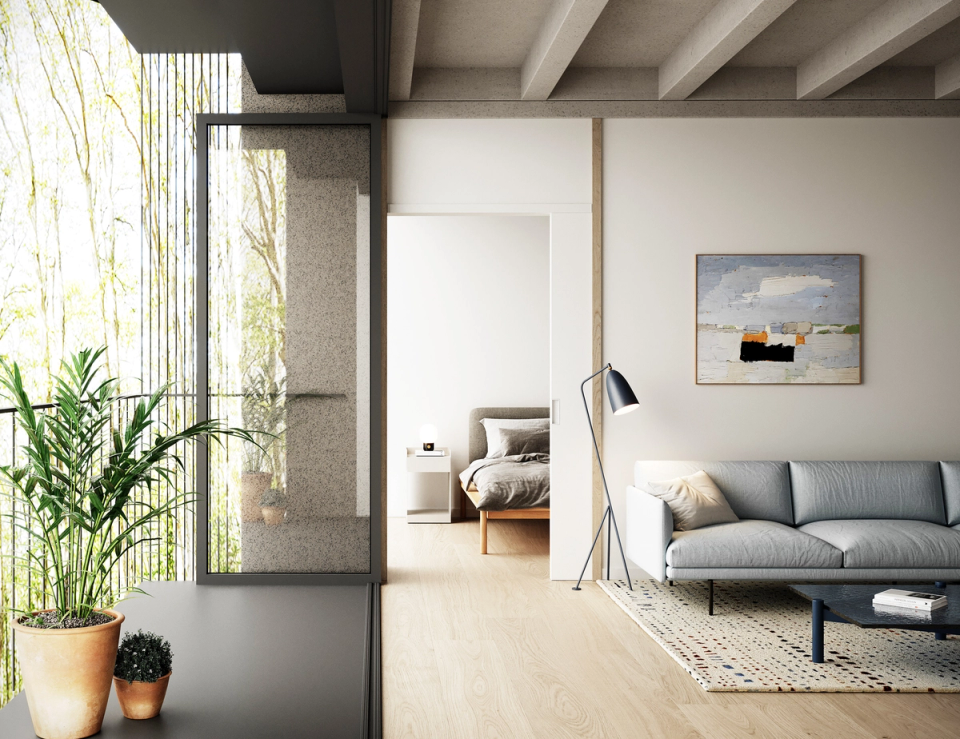 This multi-family residential building creates bright and open interiors where the relationship with the outdoors becomes an essential part of the architecture. Large openings and the presence of vegetation provide depth, calm and environmental quality to the homes. The project combines warm materials and a flexible layout to create contemporary spaces designed for well-being and daily comfort.
