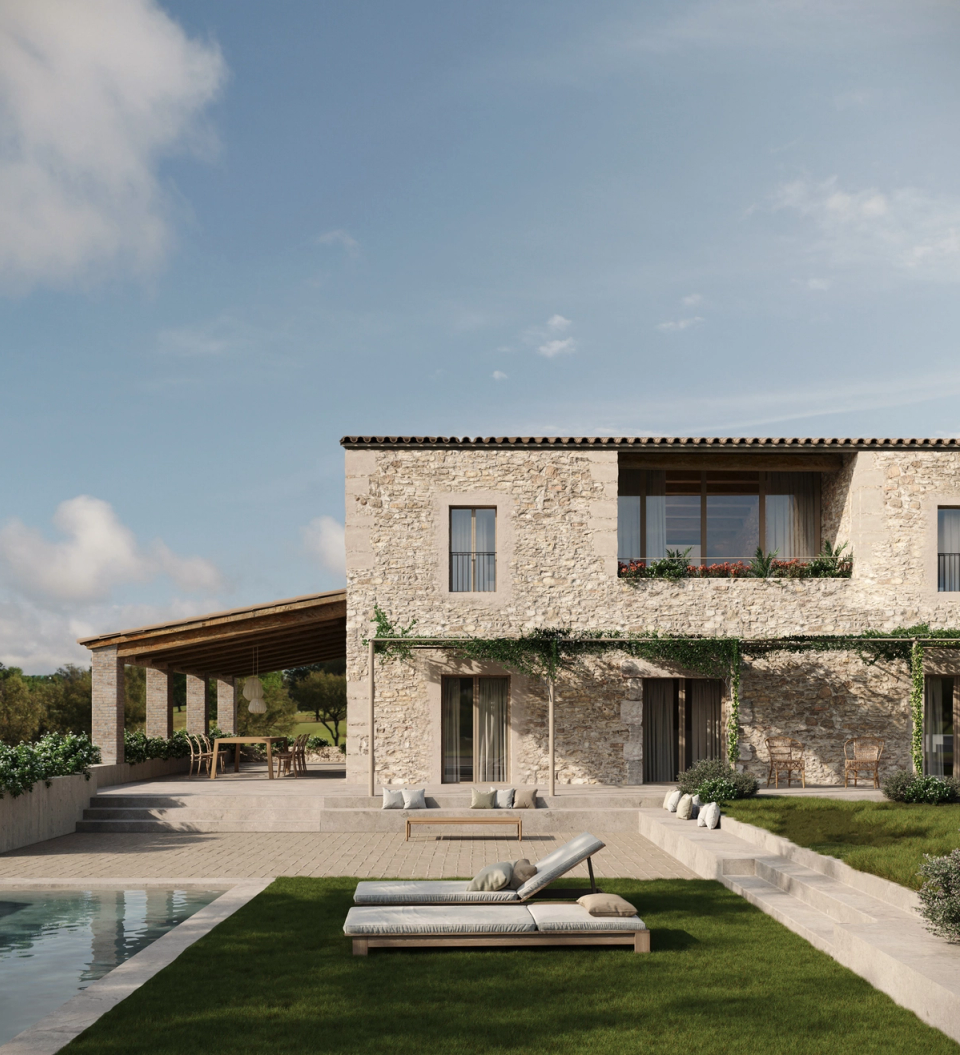 The rehabilitation and extension of this farmhouse transforms the home into a contemporary and functional space without losing its original architectural identity. The restored stone façades, open porches, and fluid connection with the outdoor spaces enhance the relationship between interior and landscape, creating a home designed to enjoy natural light and outdoor living.