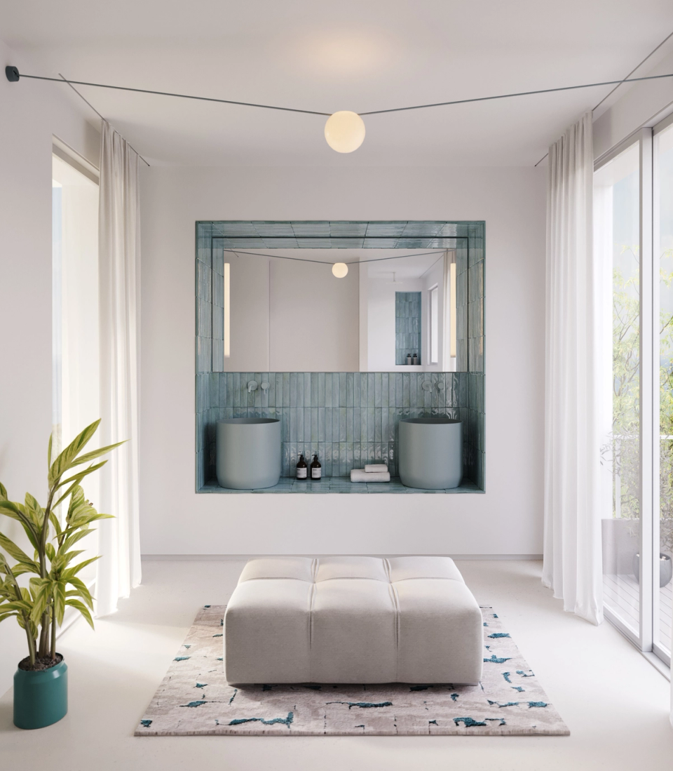 Renovation and extension project with luminous and minimalist interior spaces, where continuous materials, neutral tones, and ceramic details create an elegant and serene atmosphere. The architecture enhances natural light and the visual relationship between different spaces to generate a feeling of spaciousness and calm.