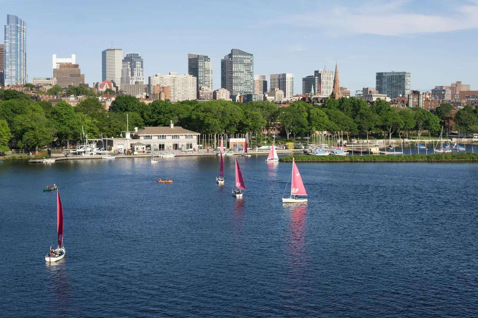 The Charles River and Boston skyline under a clear sky