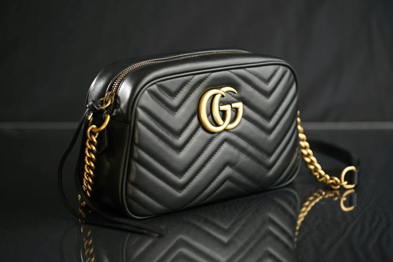 Designer handbag hardware and stitching