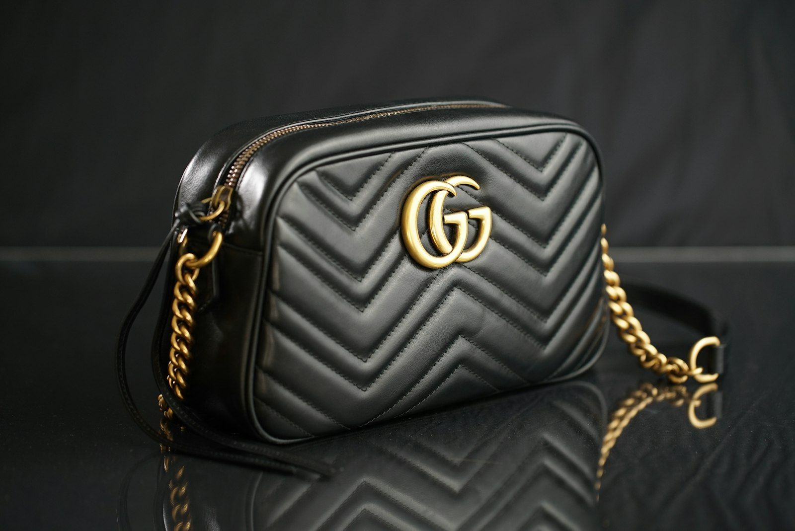 A quilted designer handbag with gold hardware