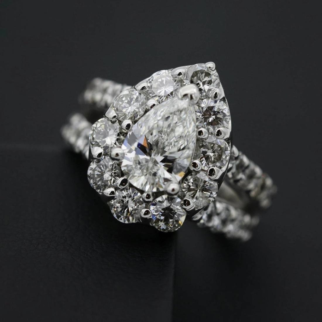 A ring examined under a jeweller's loupe