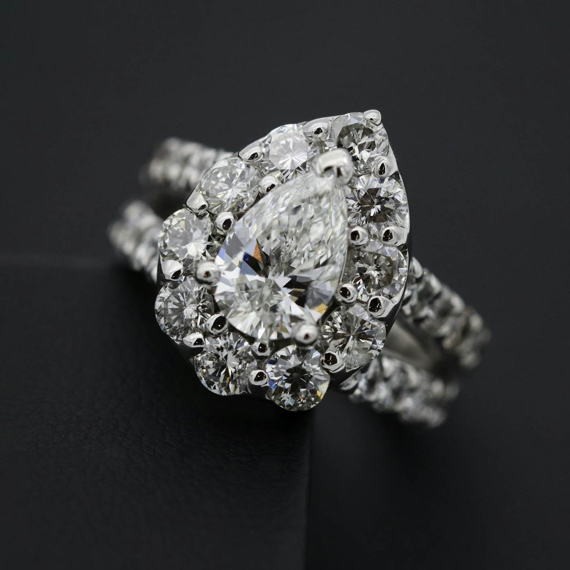 A ring examined under a jeweller's loupe