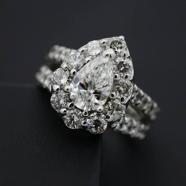 A ring examined under a jeweller's loupe