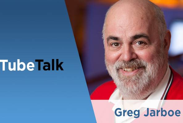 Greg Jarboe headshot with TubeTalk logo, digital marketing and SEO expert portrait