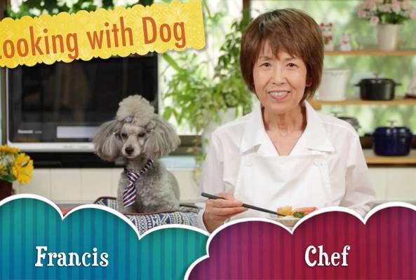 Woman chef and poodle dog named Francis in kitchen for Cooking with Dog show