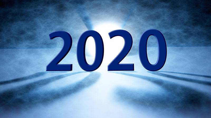 Blue 3D 2020 numbers with light and shadows on a smoky blue background.