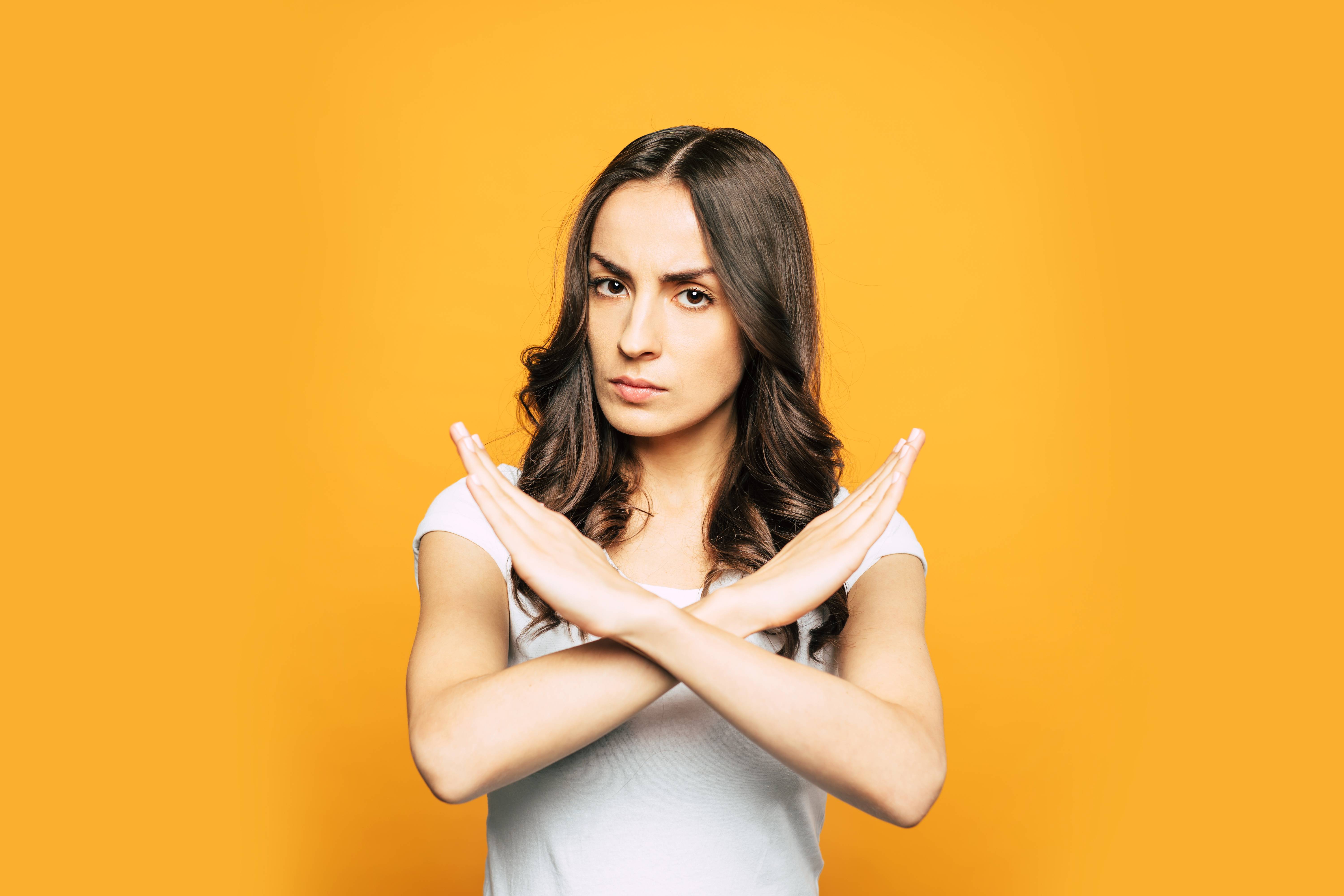 Woman gesturing "no"