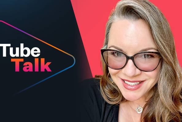 Smiling woman with glasses next to colorful Tube Talk logo on black and red background