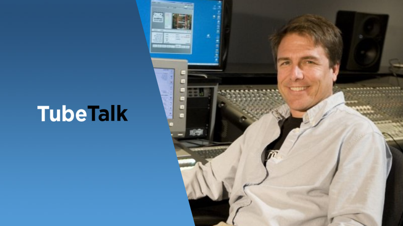 Man sitting in recording studio next to audio mixing equipment with TubeTalk logo on blue background