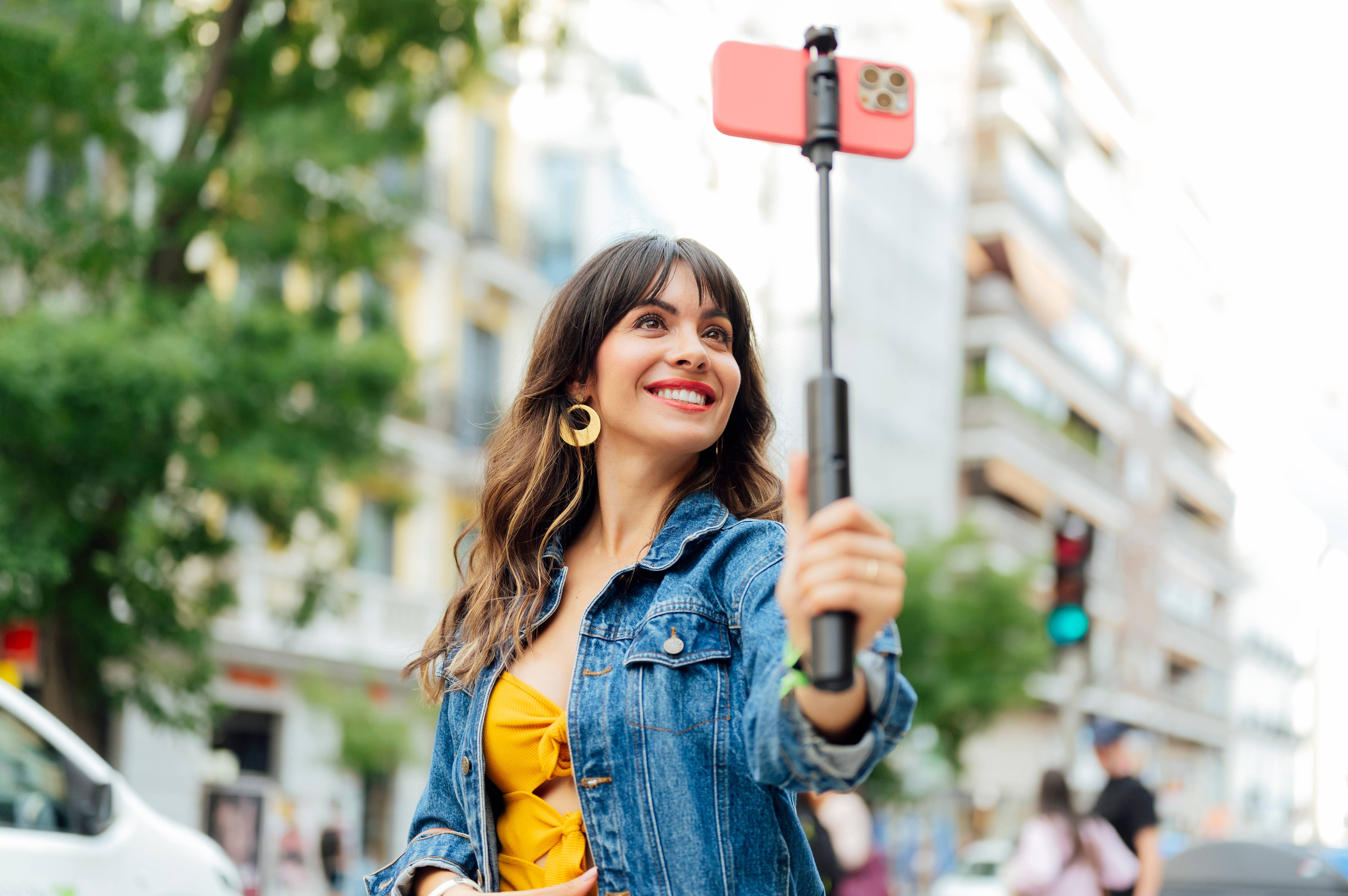 Woman shooting a vlog with smartphone