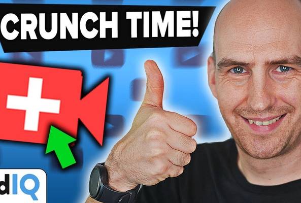 Smiling man giving thumbs up with video camera icon and text "Crunch Time" for vidIQ.