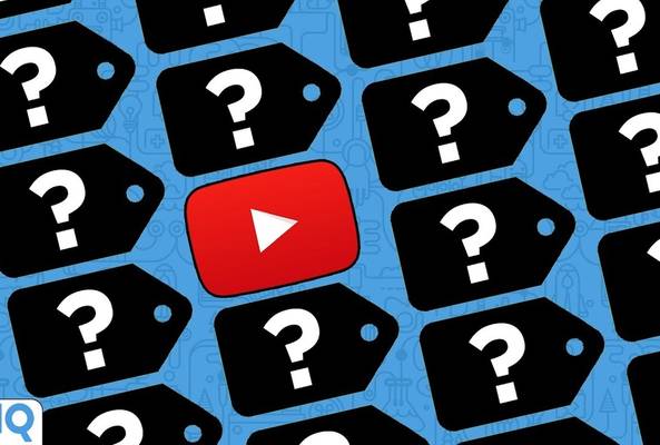 Red YouTube play button surrounded by black question mark tags on blue background.