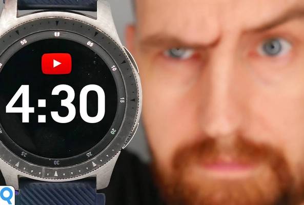 Smartwatch displaying a 4:30 YouTube timer with a blurred man in the background.