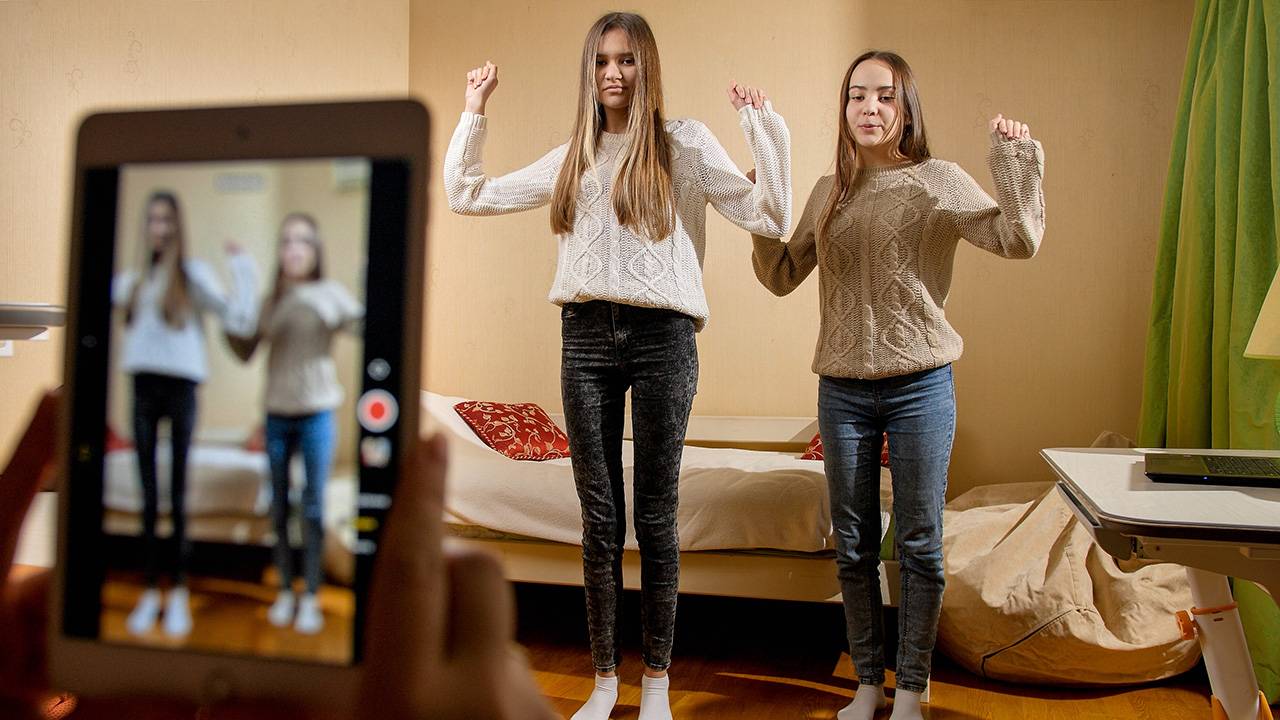 Two women filming a challenge video
