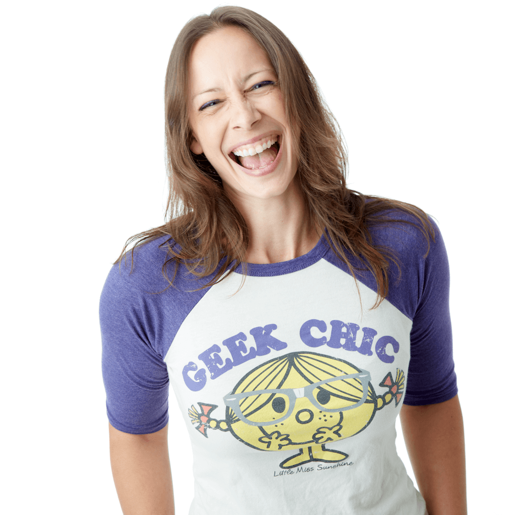 Smiling woman wearing a Geek Chic Little Miss Sunshine graphic t-shirt with purple sleeves