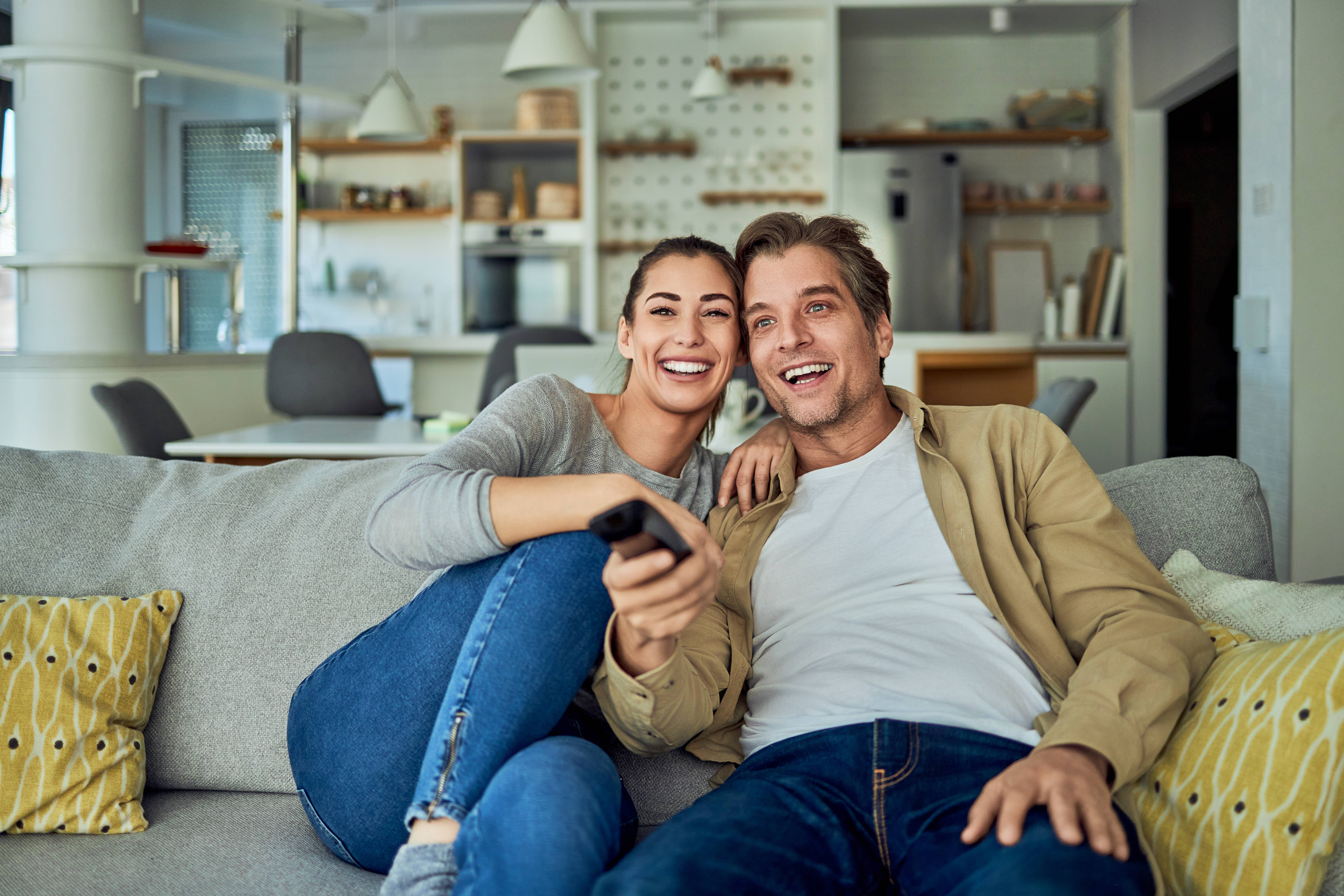 man and woman watching content and enjoying