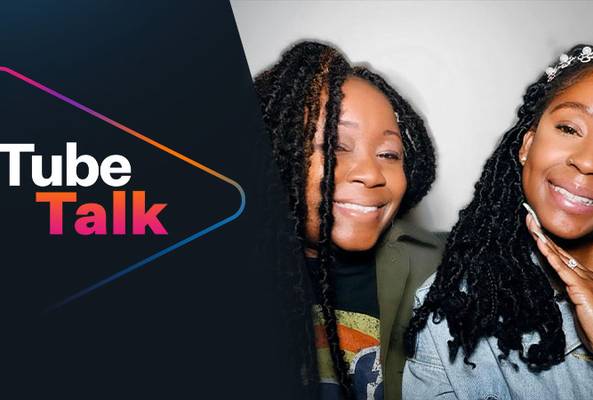 Two smiling women with braided hair beside a Tube Talk logo with colorful gradient text.