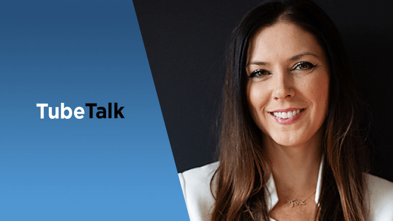 Smiling woman next to TubeTalk logo on blue and black background for video podcast branding