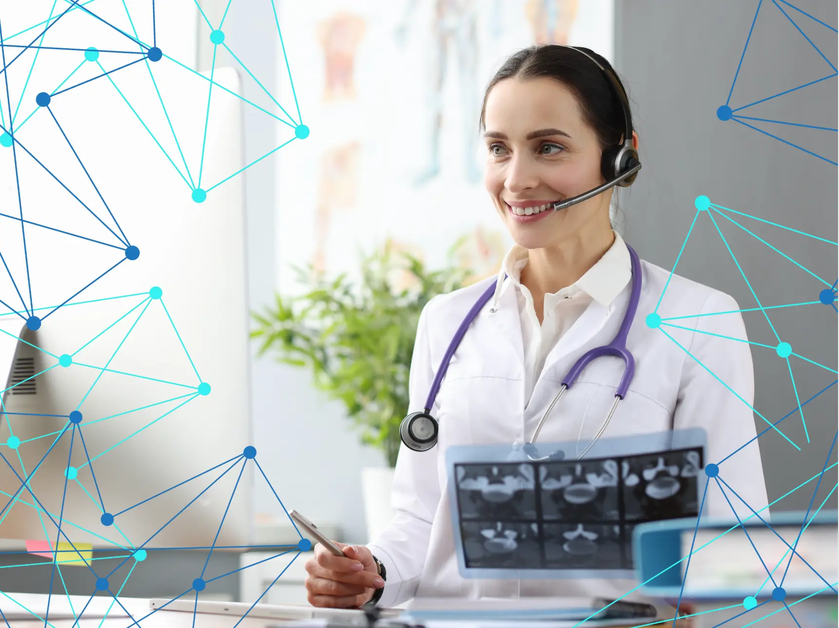 DOCTOR WITH HEADSET ON LOOKING AT AN XRAY IMAGE