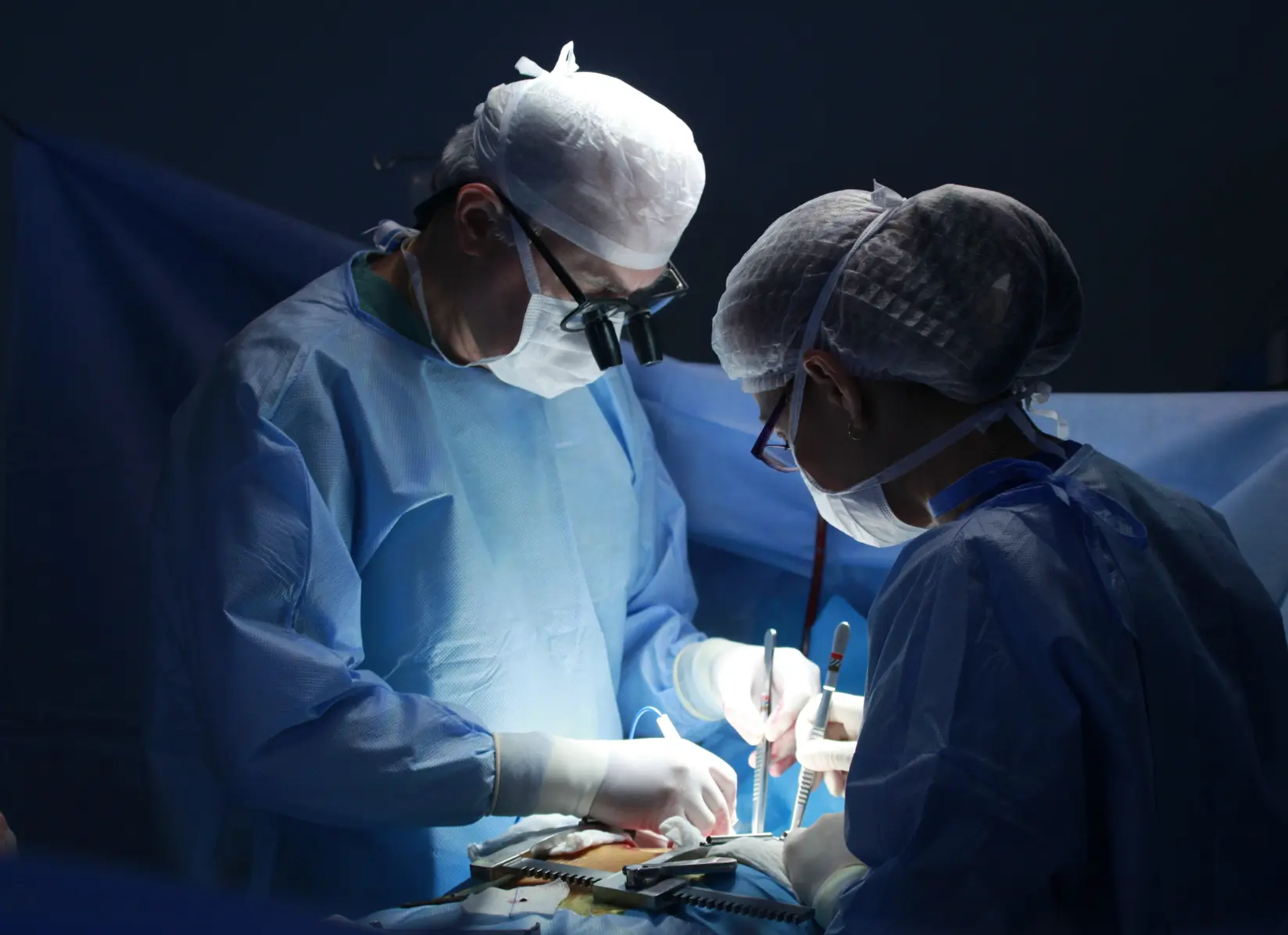 doctors doing surgery