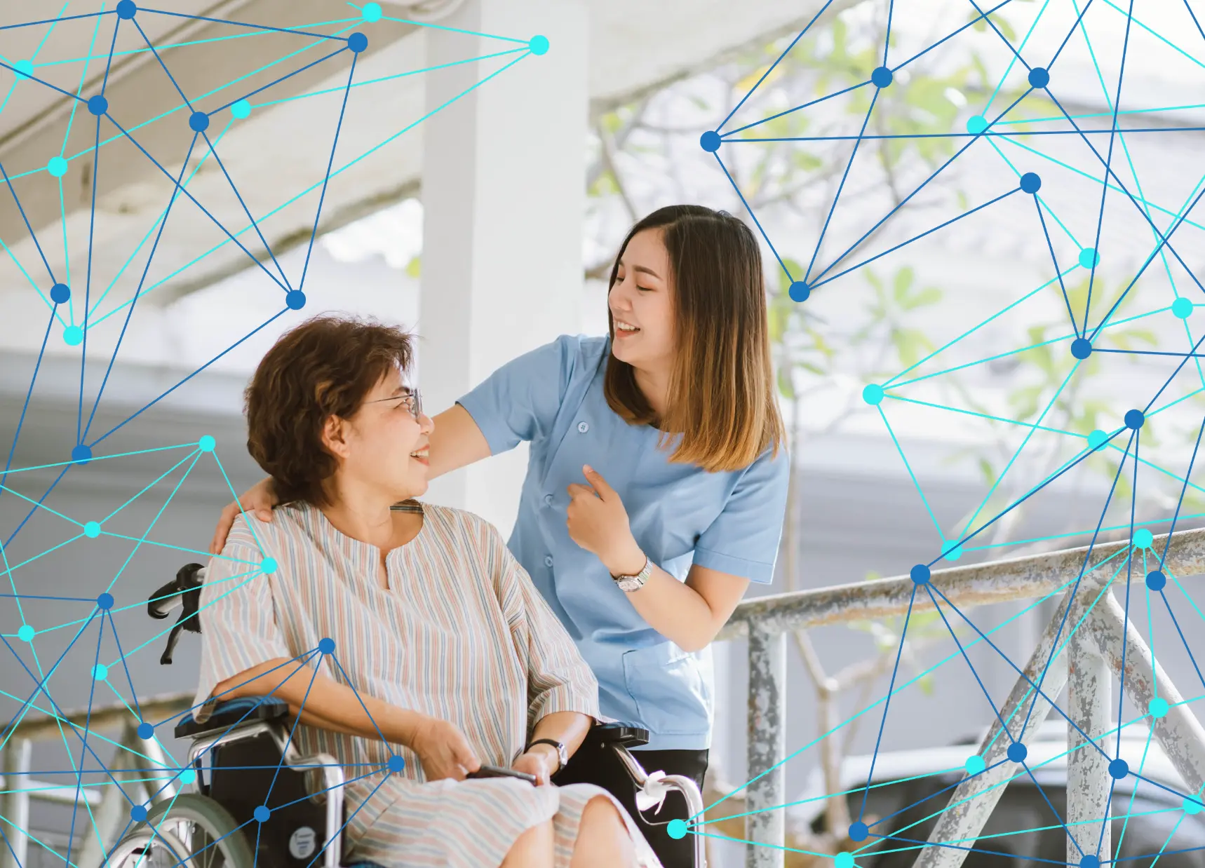 A nurse with a woman in a wheel chair in the hospital