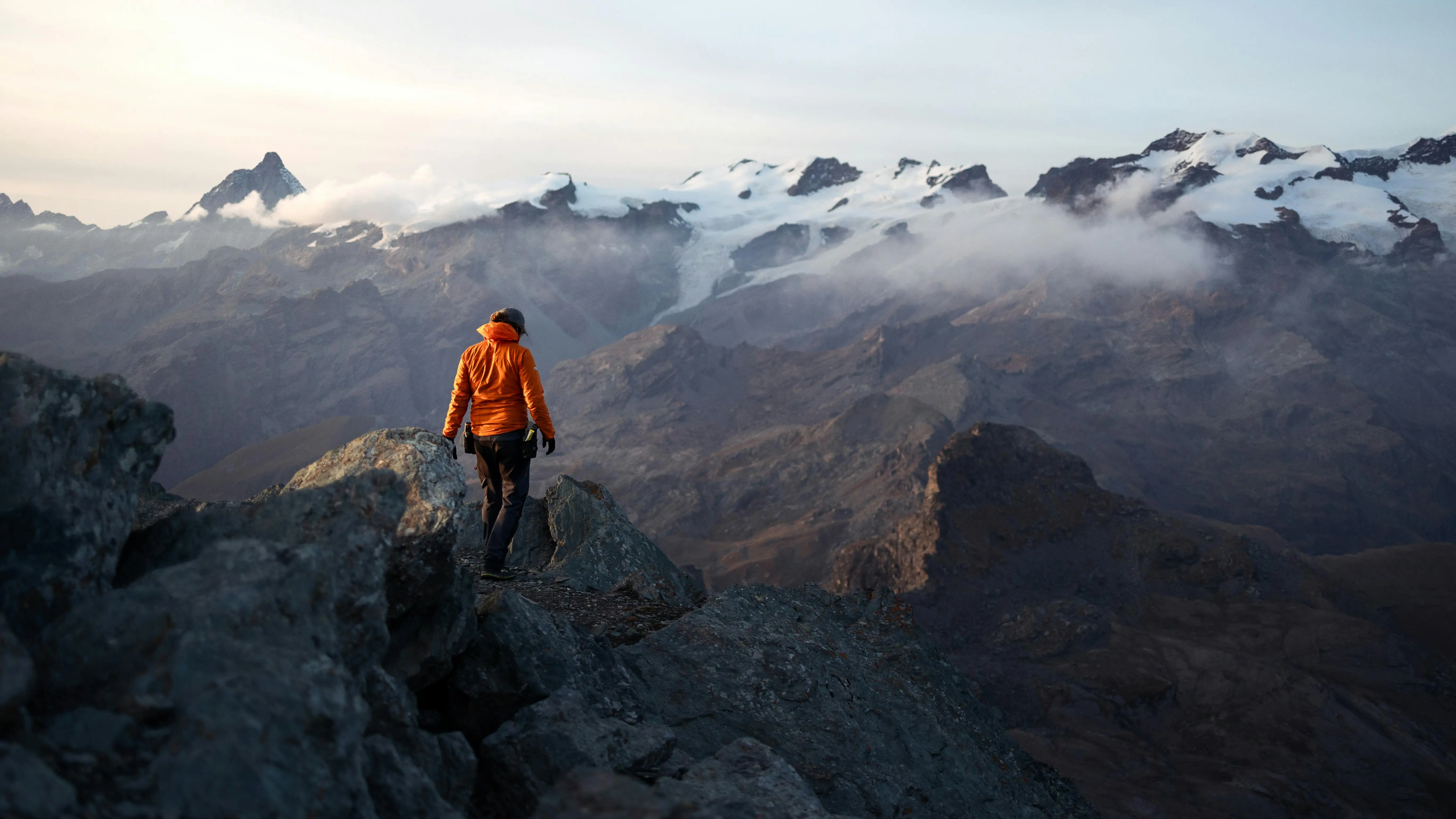 walking alone on a mountain | Quandary Consulting Group