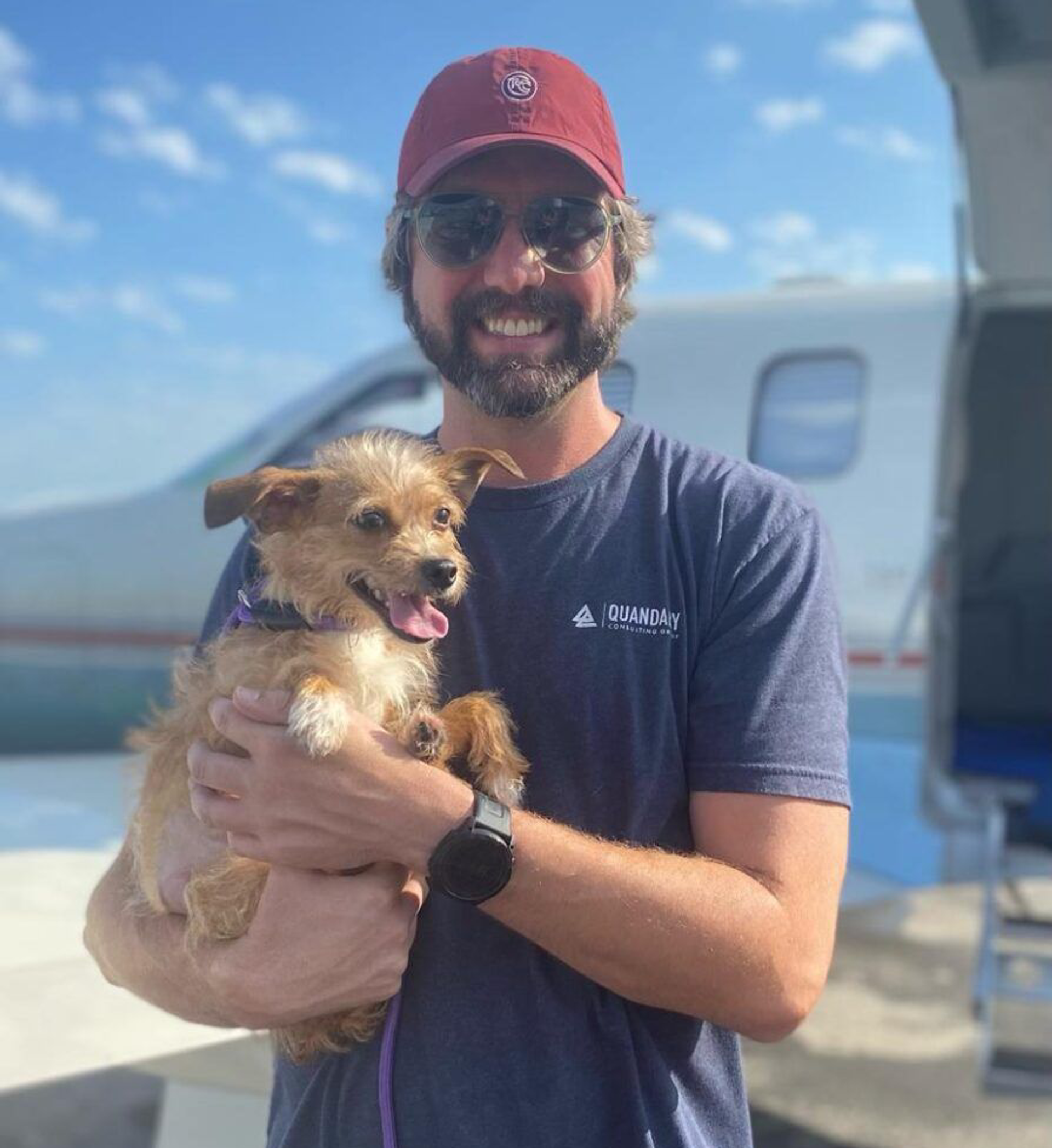 KEVIN WITH A PUPPY HE RESCUED
