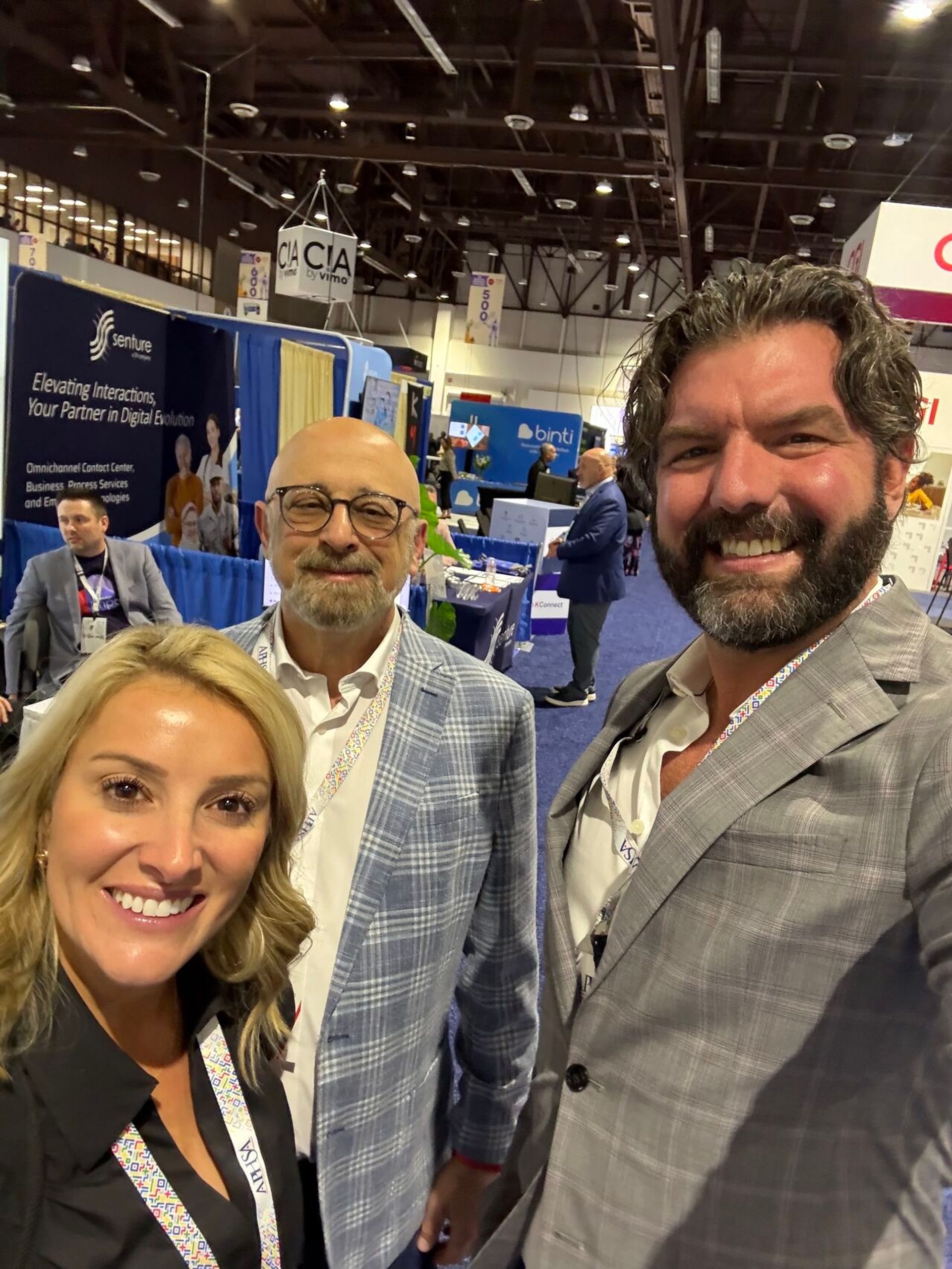jess, kevin and rick at a conference