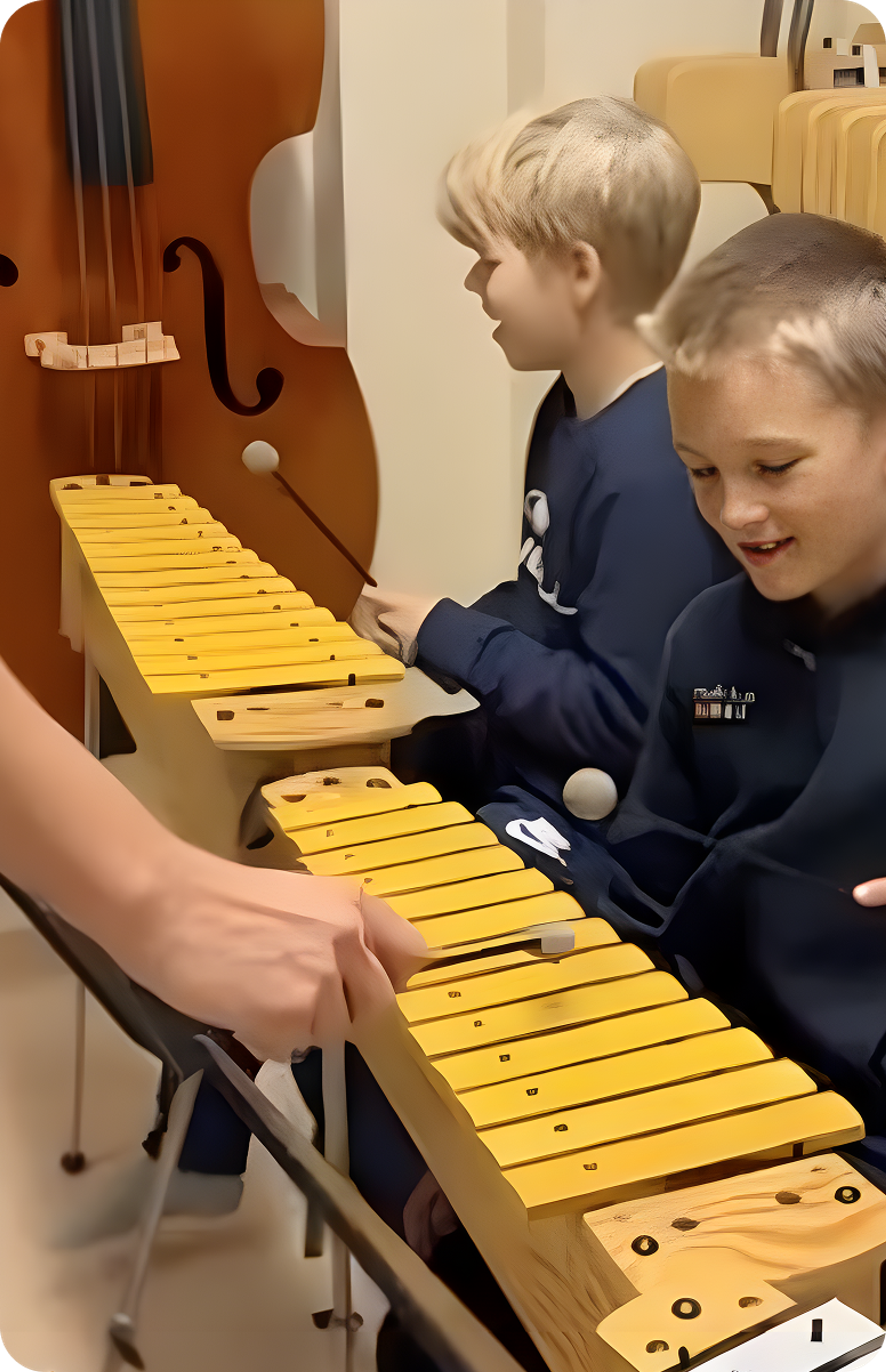 Boys playing the xylophone