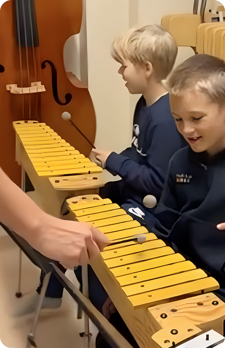 Boys playing the xylophone