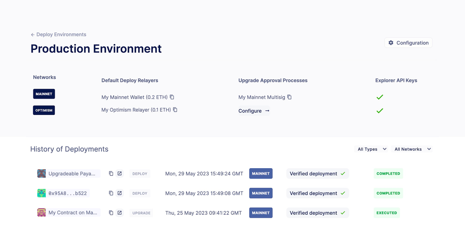 Production environment configuration dashboard showing networks, deploy relayers, upgrade approval processes, API keys, and deployment history with status indicators.