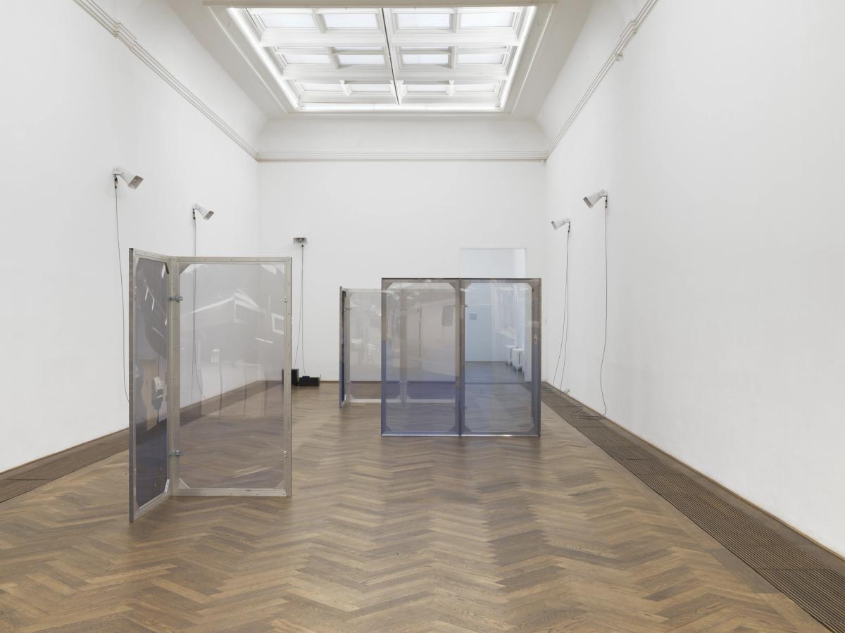 Dorota Gawęda and Eglė Kulbokaitė, Enclosure (upiór) I-VIII, 2024. Aluminium, wood, digital print on chiffon. 200 x 100 x 3.5 cm each (variable dimensions of installation).