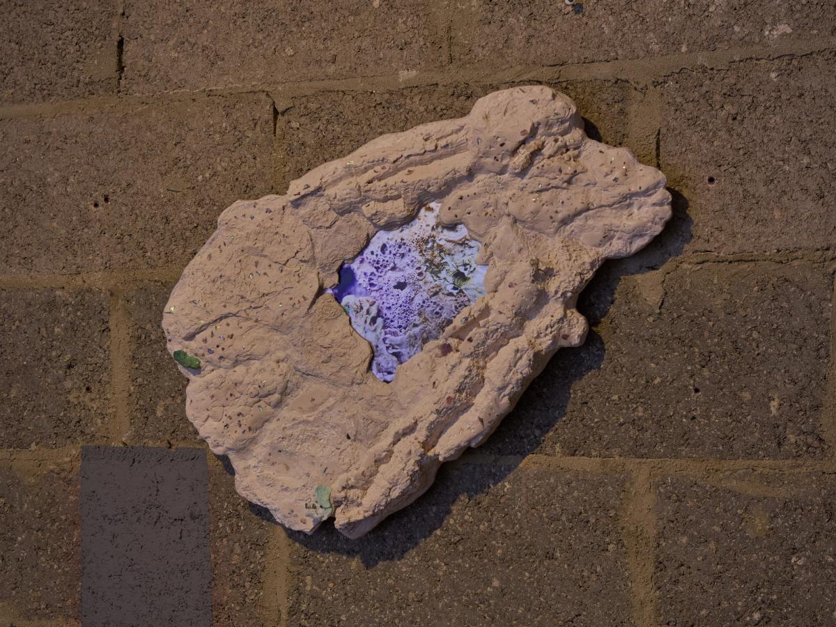 The Other Writing (like the semisolid in the chrysalis), 2023, aqua resin, aluminum, oyster shell fragment, crushed abalone shell, opal, stone, wood, 16⅞ (H) x 24¾ (W) x 4 (D) in /43 x 63 x 10 cm
