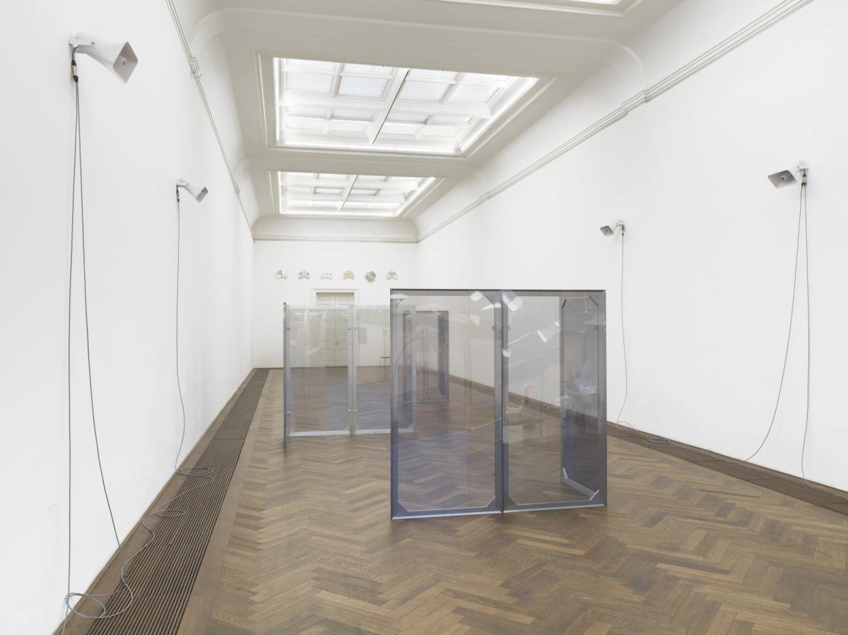 Dorota Gawęda and Eglė Kulbokaitė, Enclosure (upiór) I-VIII, 2024. Aluminium, wood, digital print on chiffon. 200 x 100 x 3.5 cm each (variable dimensions of installation).