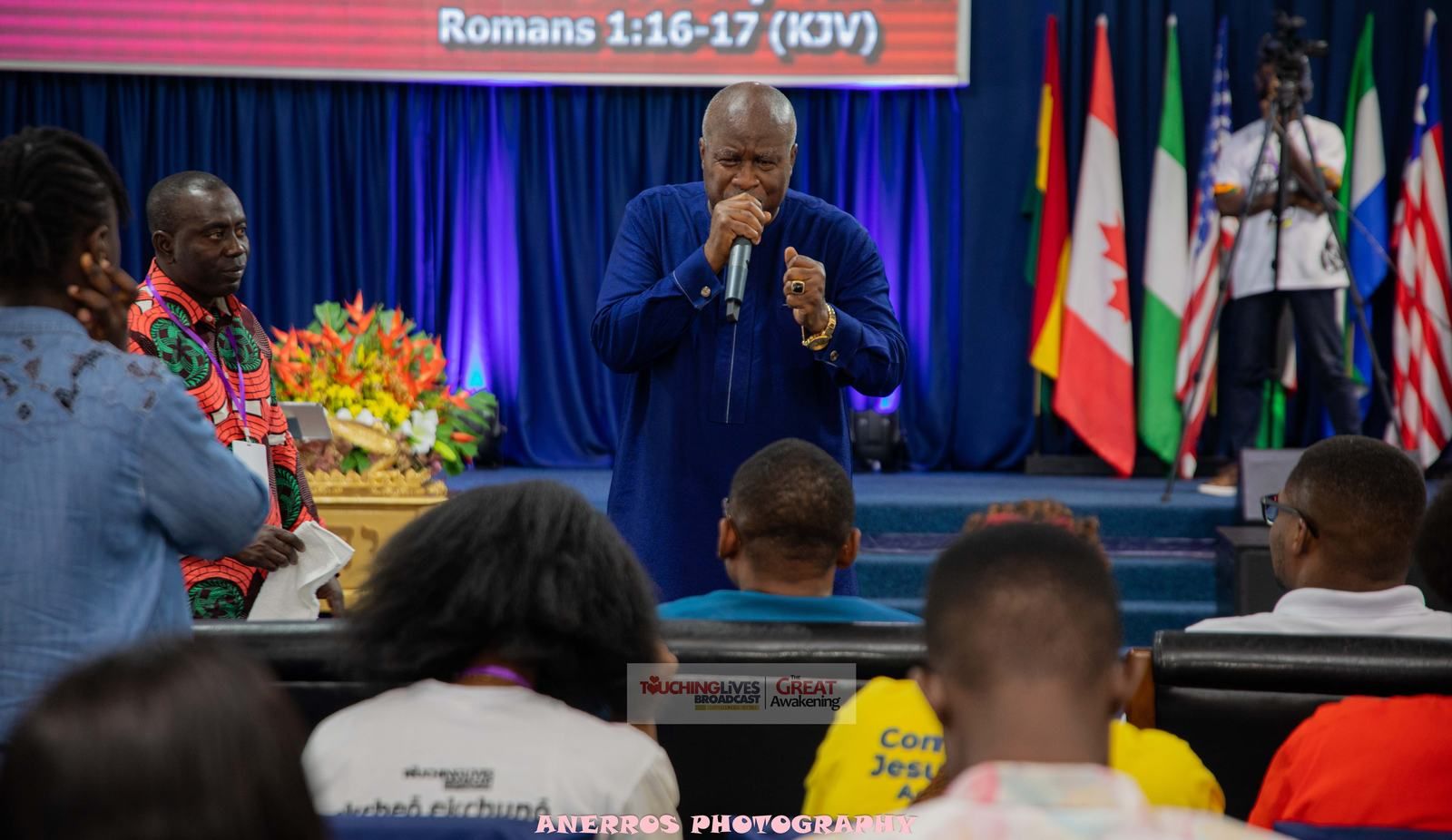 Ministration from the stage before the flags of the nations