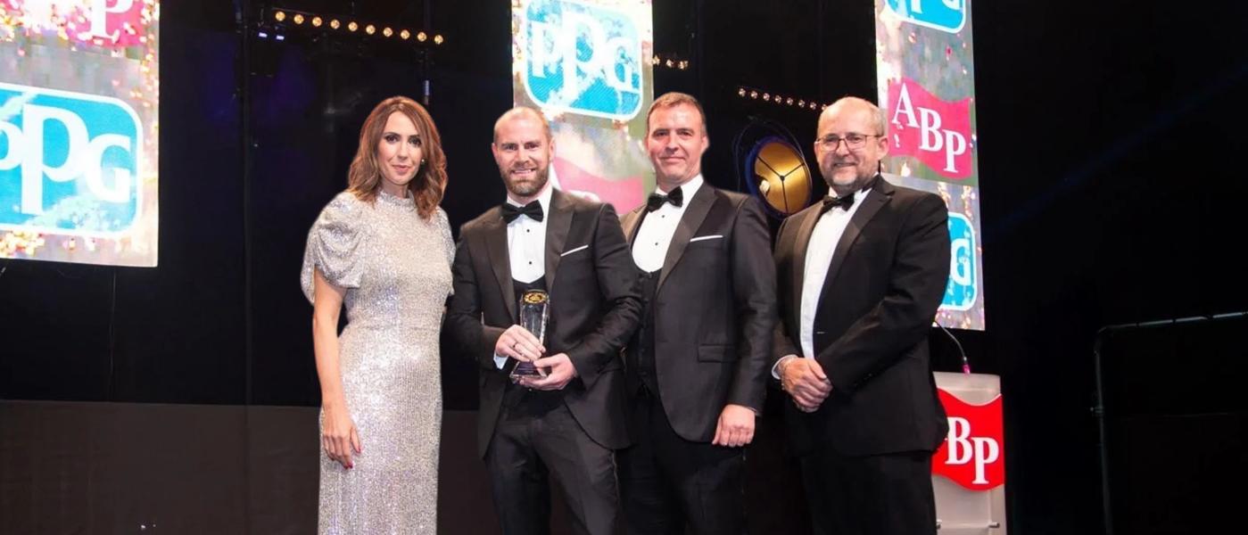 GRM Bodycraft founders, Graeme and Ryan, being presented with the National ARG Network Bodyshop Group of the Year Award at the ABP British Bodyshop Awards 2022 in Manchester.