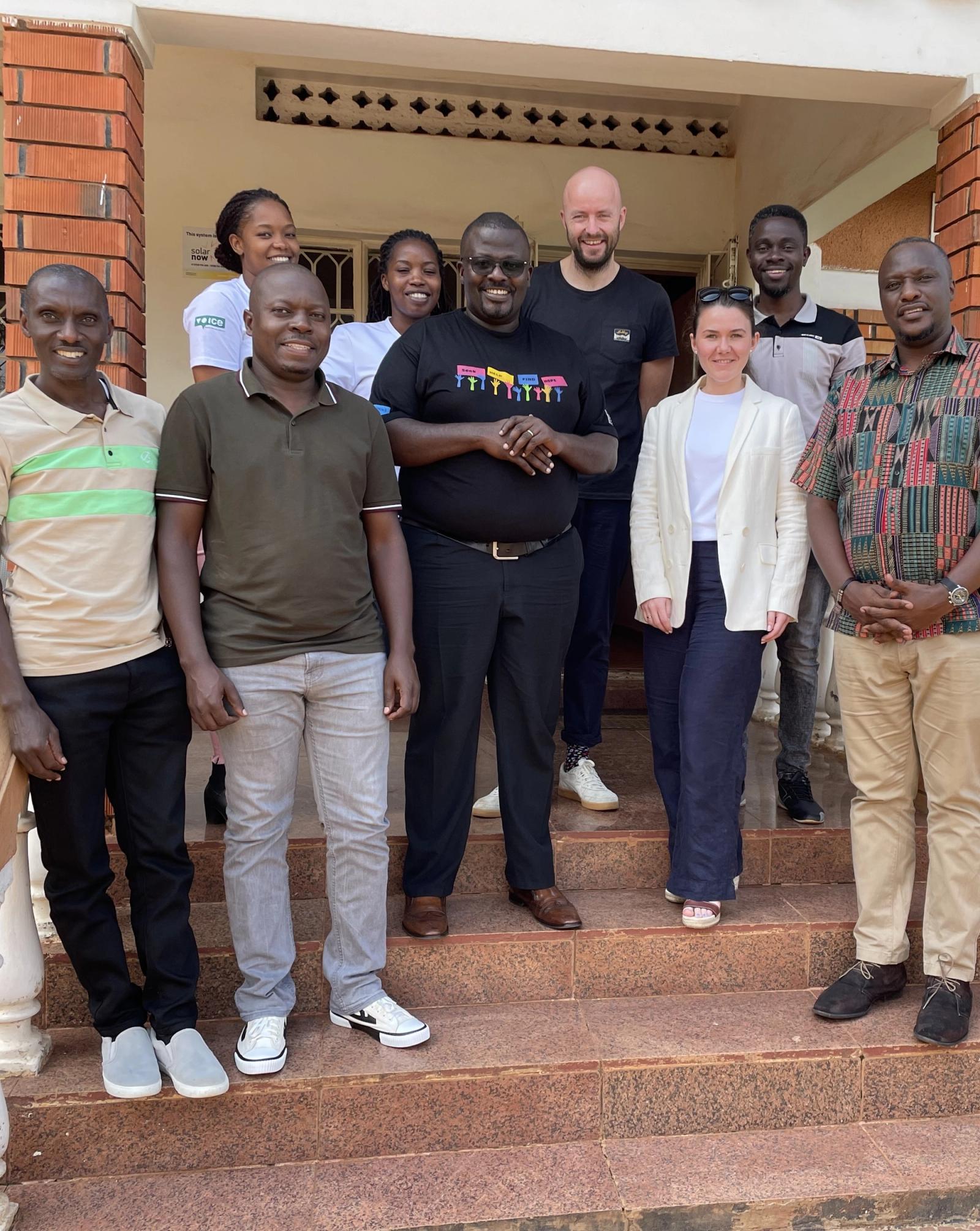 Two of our employees on a project visit to Uganda