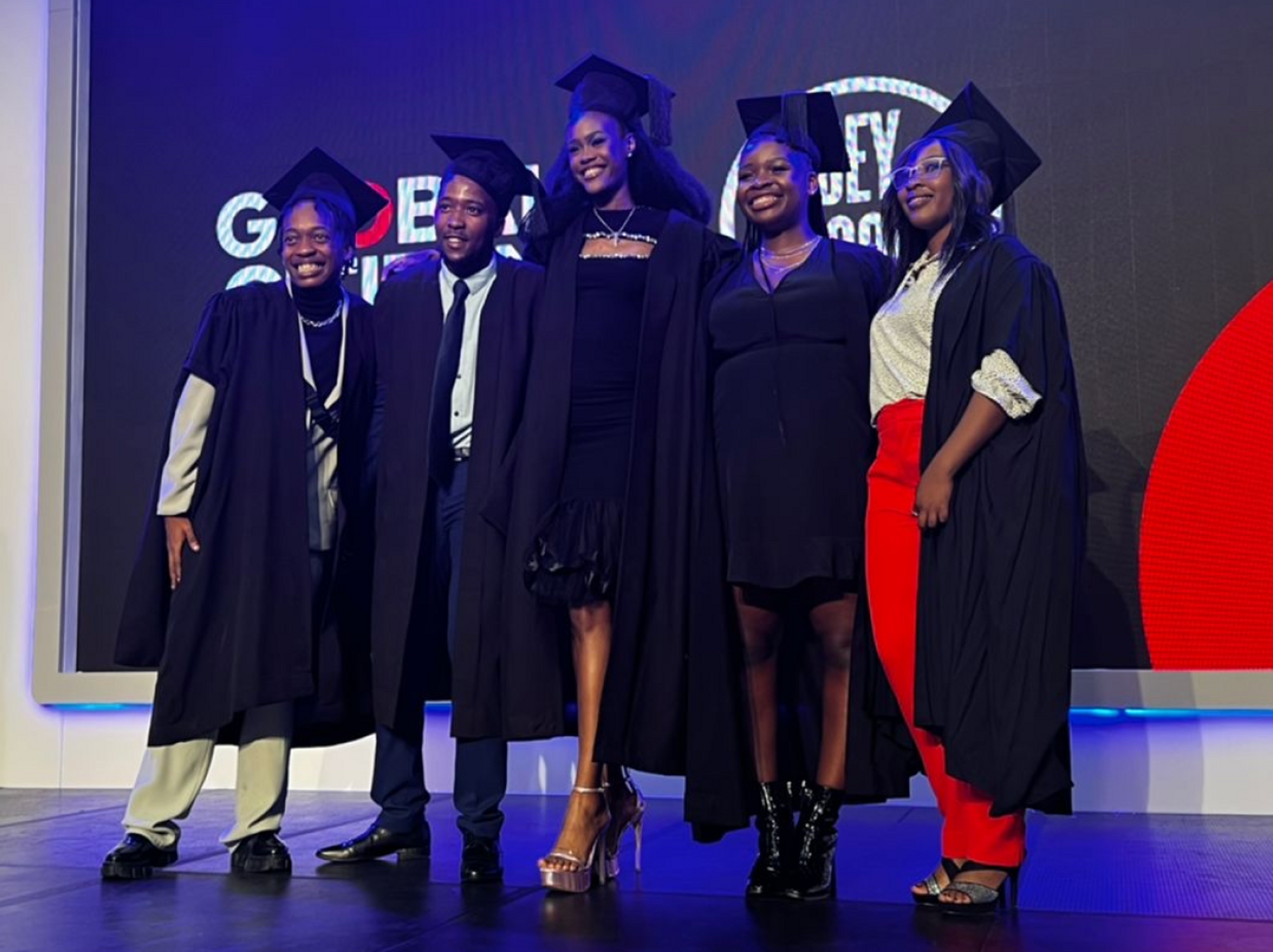 scholars on stage