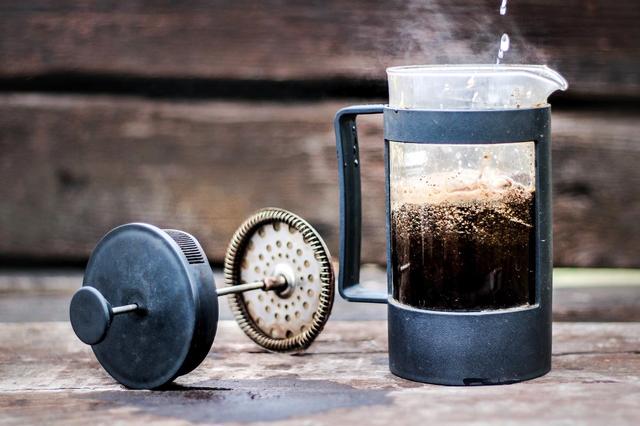 Pouring Hot Water into Glass French Press